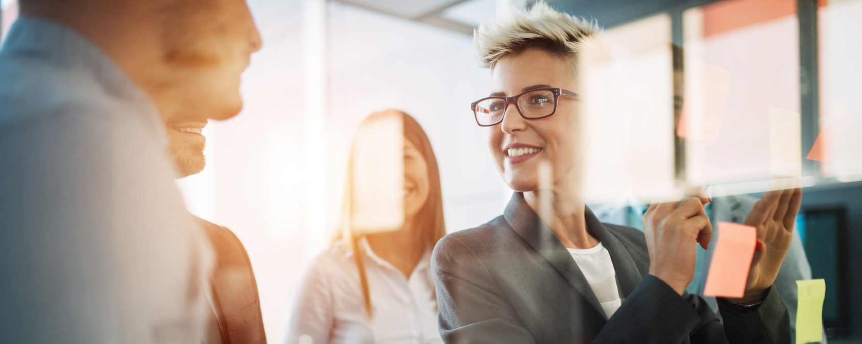 Business people planning strategy in modern office together